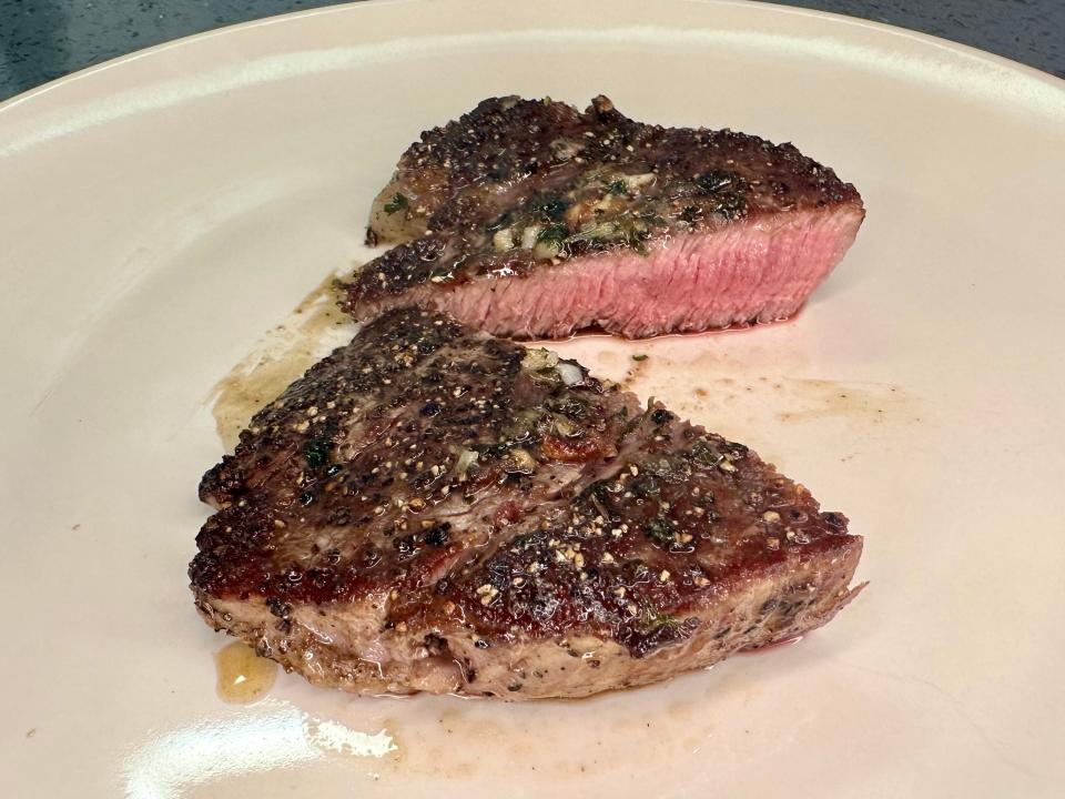 Steak that was cooked on a stovetop.