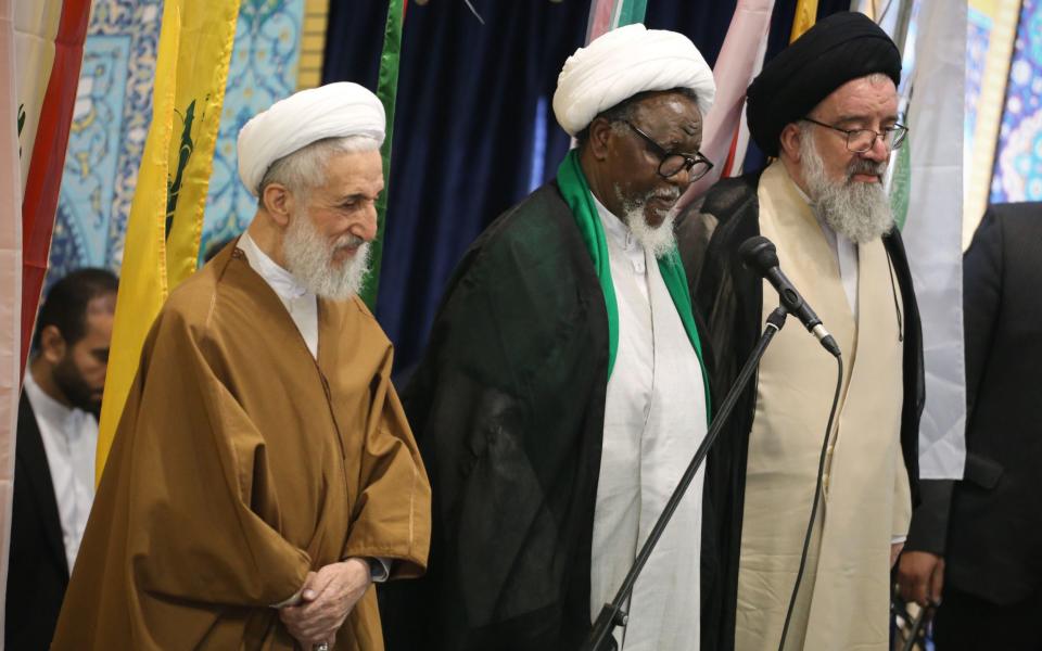 Kazem Sedighi, (left) with  Ahmad Khatami (right), a Shiite cleric and the leader of Shi'as in Nigeria Ibrahim Zakzaky during a prayer ceremony