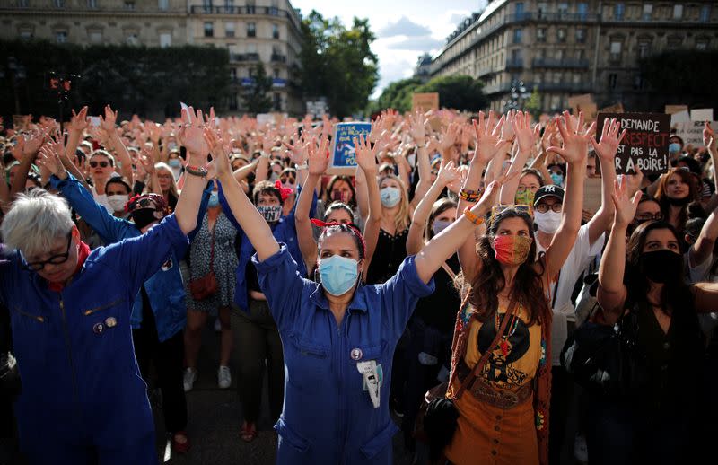 Feminist activists demonstrate against new government appointments in Paris