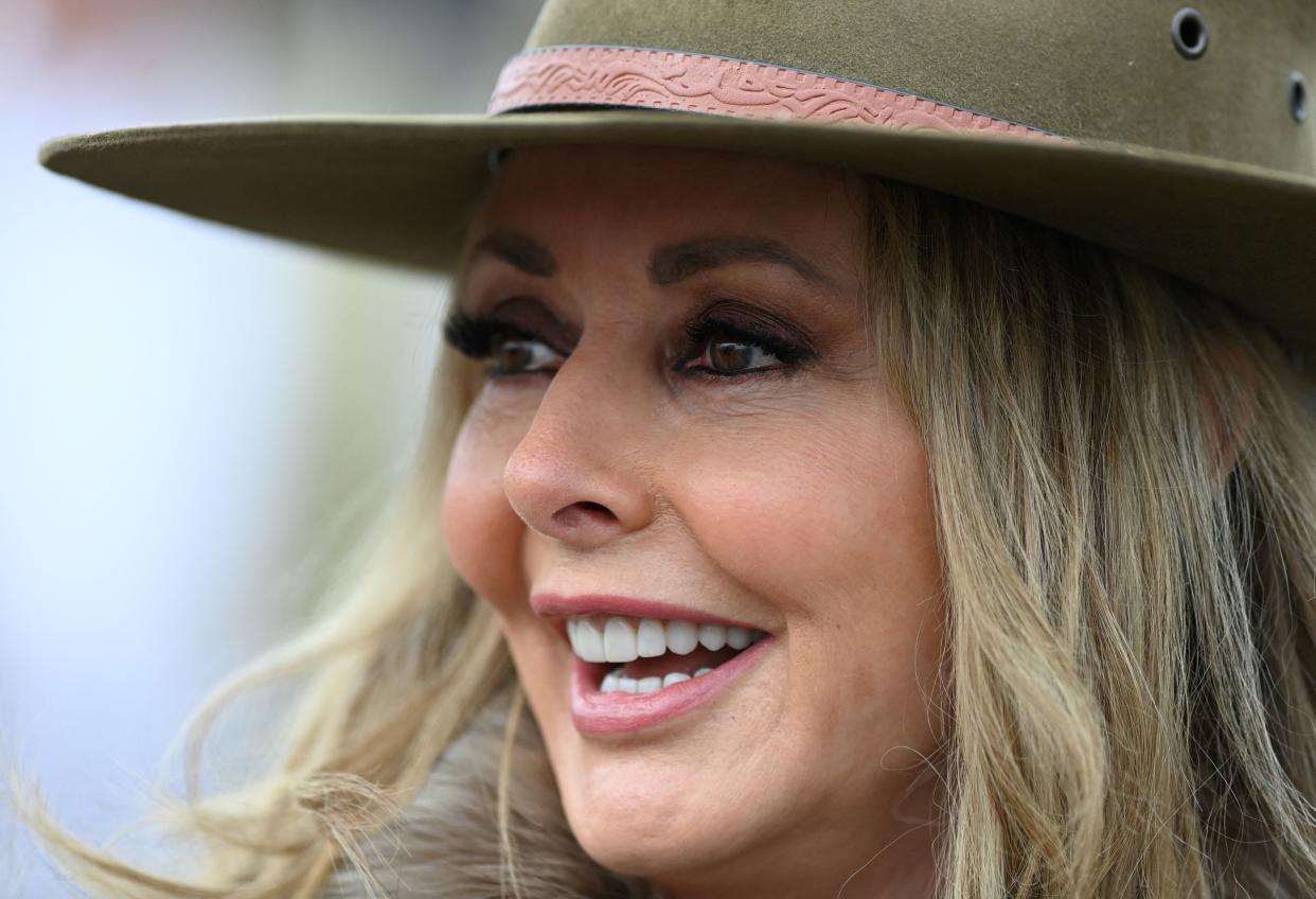 British TV personality Carol Vorderman arrives on the second day of the Cheltenham Festival at Cheltenham Racecourse, in Cheltenham, western England on March 15, 2023. (Photo by Glyn KIRK / AFP) (Photo by GLYN KIRK/AFP via Getty Images)