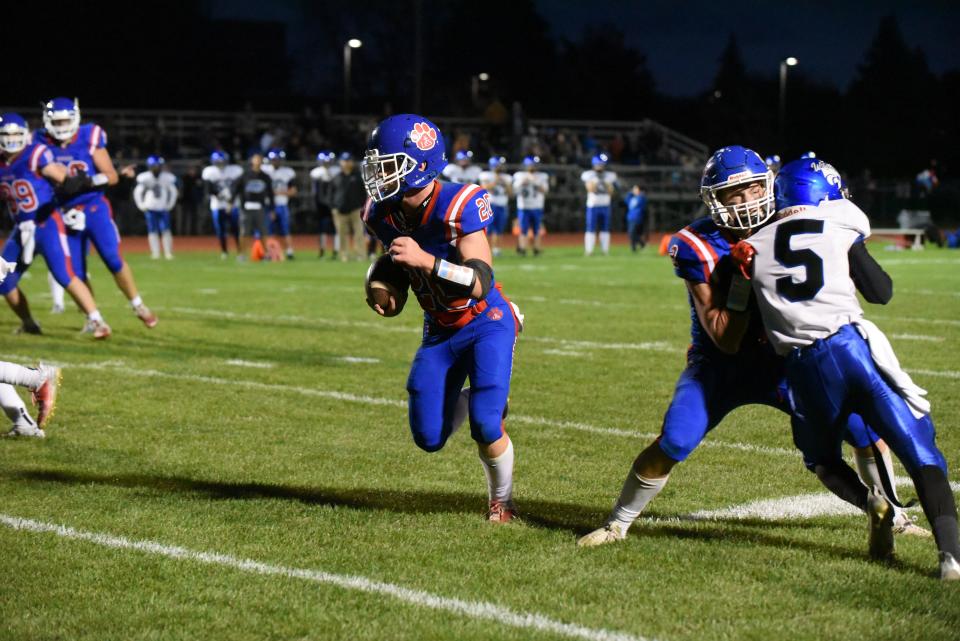 Lenawee Christian's Elijah Lutz runs in for a touchdown during the Week 8 game against Pittsford.