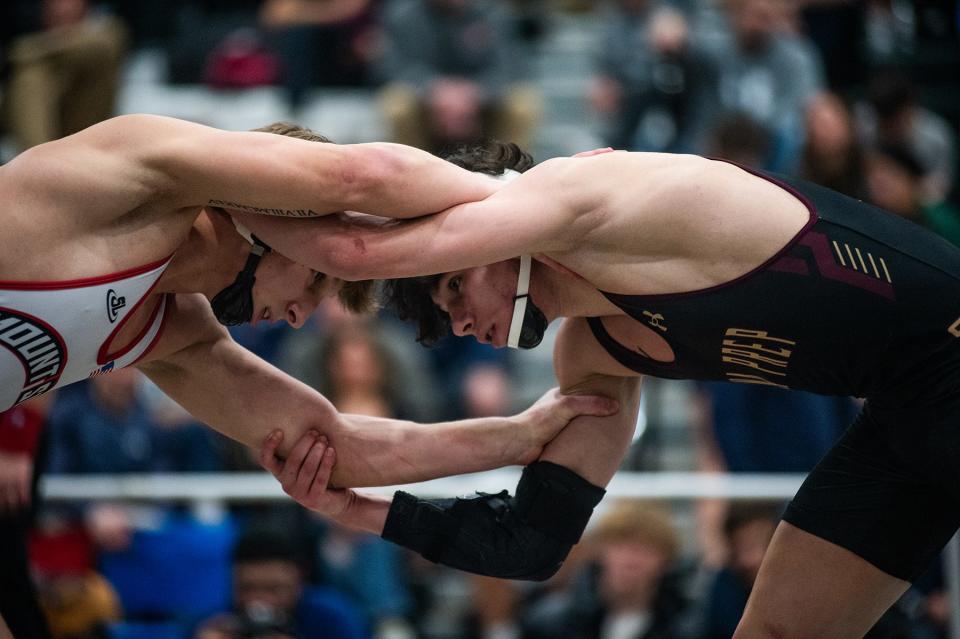 Iona Prep's Justin Shay, right, wrestles Mount Sinai's Brayden Fahrbach in the 138 pound boys champsionship round during Eastern State Classics at SUNY Sullivan in Loch Sheldrake, NY on Saturday, January 13. 2024.