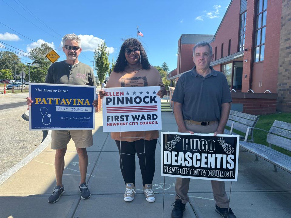 Candidates for Newport City Council’s First Ward seat campaign outside Pell Elementary on Primary Day. From left to right: Charles Pattavina, Ellen Pinnock and Hugo DeAscentis Jr.