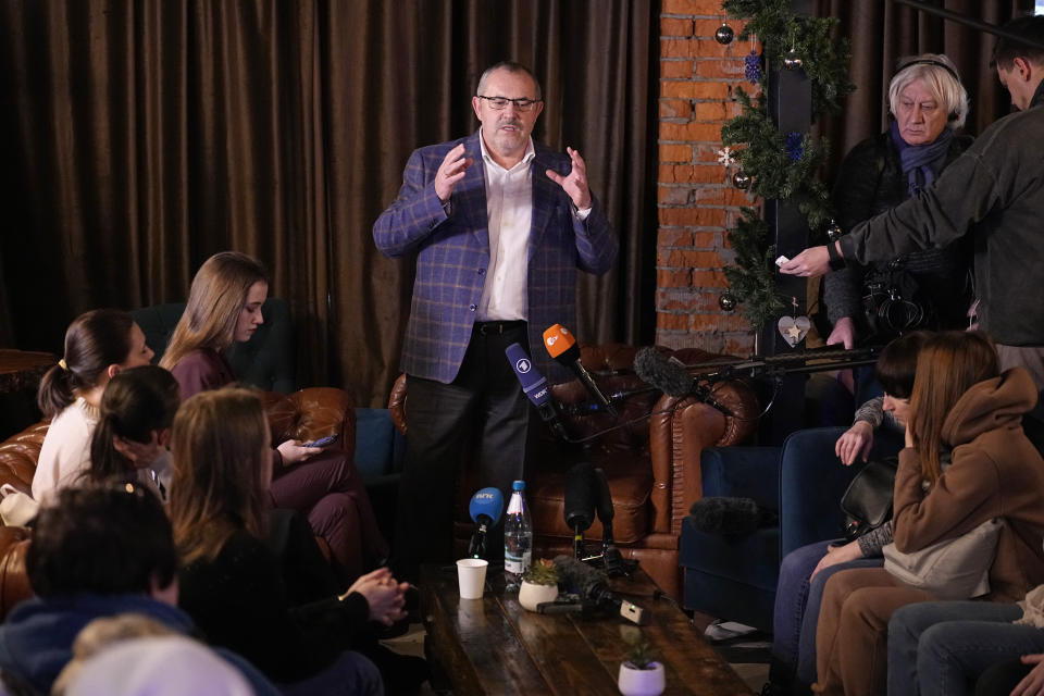 Boris Nadezhdin, centre, a liberal Russian politician who aspires to run for president in March's presidential election, attends a meeting with soldiers' wives in Moscow, Russia, Thursday, Jan. 11, 2024. Wives of some of Russian soldiers who were called up for military service during a partial mobilization in 2022, have pushed for them to be discharged from the ranks. (AP Photo/Alexander Zemlianichenko)