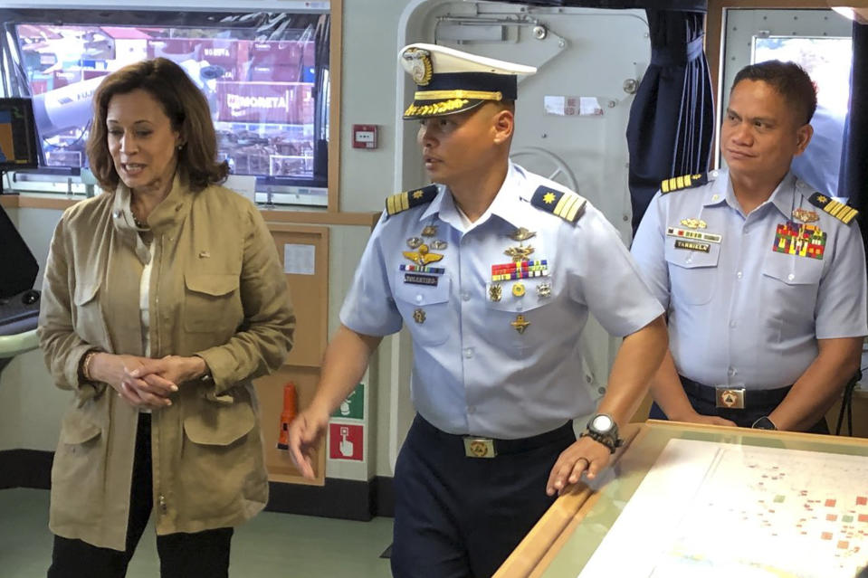 In this photo provided by the Philippine Coast Guard, U.S. Vice President Kamala Harris, left, is given a tour on board the Philippine Coast Guard BRP Teresa Magbanua (MRRV-9701) during her visit to Puerto Princesa, Palawan province, Philippines, Tuesday, Nov. 22, 2022. (Philippine Coast Guard via AP)