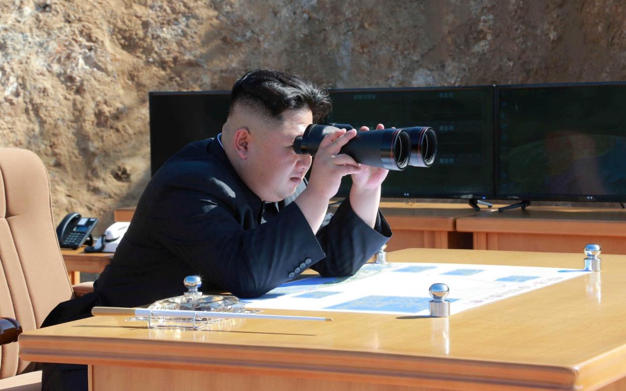 North Korean Leader Kim Jong Un looks on during the test-fire of inter-continental ballistic missile Hwasong-14 - REUTERS