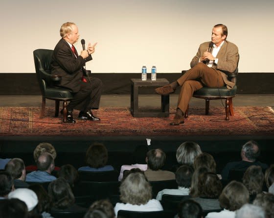 John Grisham in an interview with Hollywood reporter and critic Duane Byrge about the film-adaptations of his novels, during the 2005 Virginia Film Fest on Oct. 28, 2005.<span class="copyright">Andrew Shurtleff—The Daily Progress/AP</span>