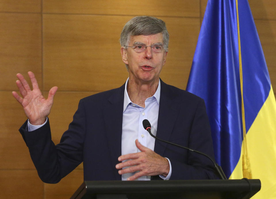 In this file photo taken on July 27, 2019, US Ambassador in Ukraine William Taylor speaks during a briefing in Kyiv, Ukraine. William Taylor, the top American diplomat in Ukraine, is set to appear Tuesday before impeachment investigators in U.S. Congress, joining a parade of current and former diplomats testifying about Trump's dealings with Ukraine.(AP Photo/Inna Sokolovska)