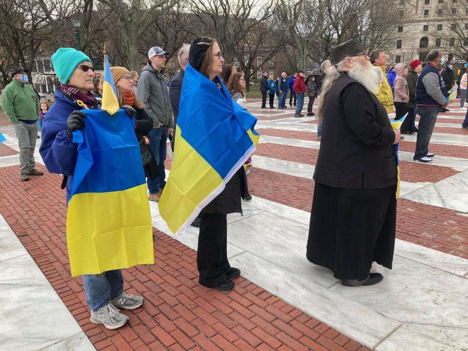 Supporters of Ukraine rally in front of the Rhode Island State House on Saturday as part of an interfaith effort to pray for peace and raise money for humanitarian relief.