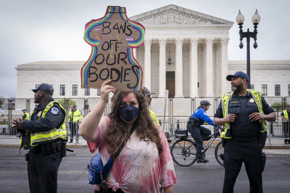 Roberta Plantak, 33, Laurel, Md., poses for a portrait as she demonstrators for abortion rights, Saturday, May 14, 2022, outside the Supreme Court in Washington, during protests across the country. "I think it will be overturned, and this is just one small indicator of more protections to be overturned. I'm Queer and I see the next steps to be taking away some of those potential laws that protect us," she said. "I feel like the terminology that we use is no longer applicable. It's not pro-life; it's forced birth extremists. I would never force ANY person to have an abortion against their will. That's not anything that's ever been said in the pro-choice universe, but forced birth is an accurate picture of what we are seeing." (AP Photo/Jacquelyn Martin)