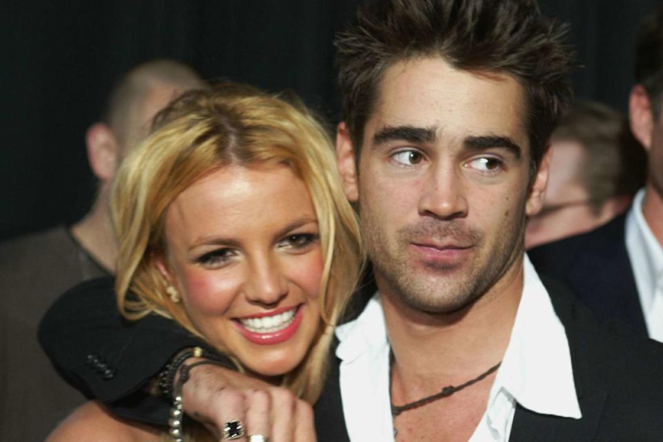 <p>Kevin Winter/Getty Images</p> Britney Spears and Colin Farrell in Hollywood in January 2003