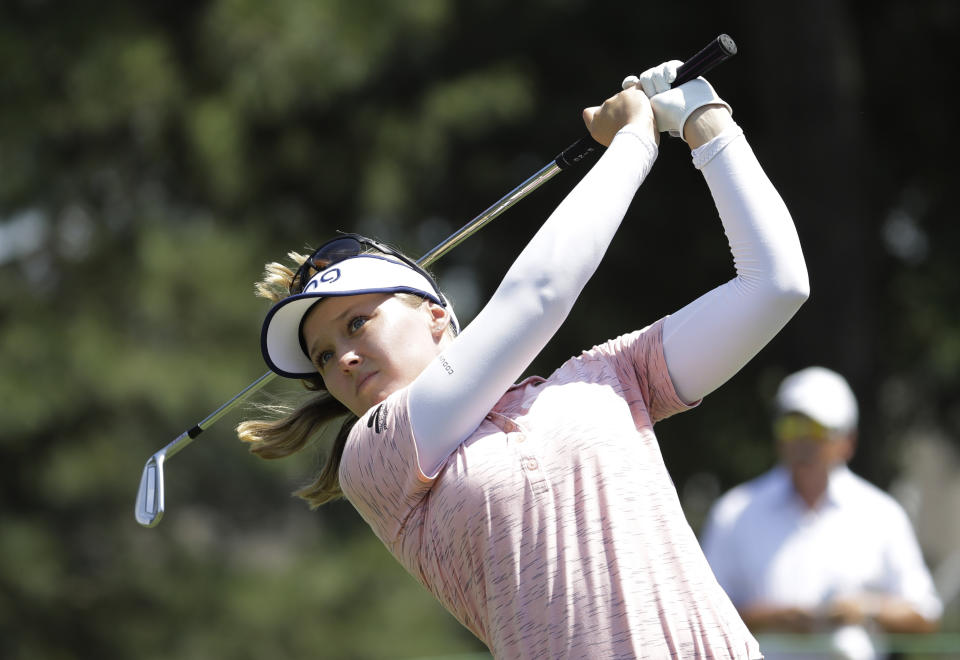 Brooke Henderson watches his tee shot on the second hole during the final round of the Pure Silk Championship golf tournament at Kingsmill Resort, in Williamsburg, Va., Sunday, May 26, 2019. (AP Photo/Steve Helber)