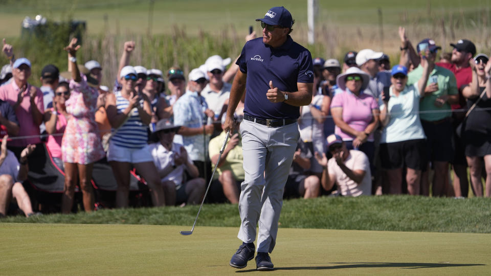 Phil Mickelson reacts to his birdie putt on the seventh green during the final round at the PGA Championship golf tournament on the Ocean Course, Sunday, May 23, 2021, in Kiawah Island, S.C. (AP Photo/David J. Phillip)