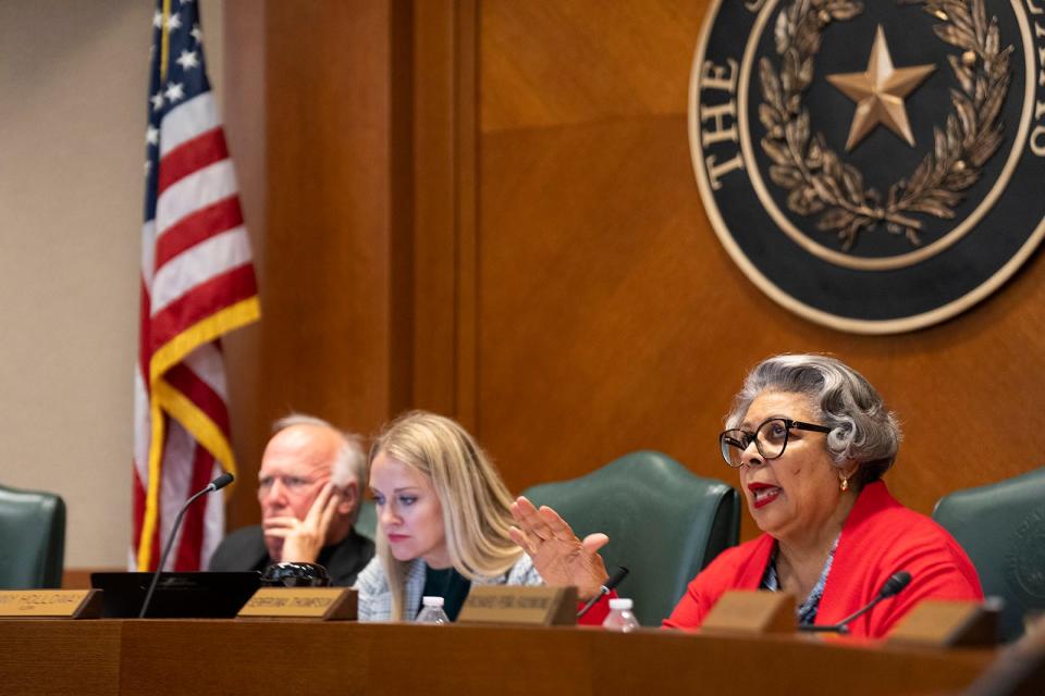 Rep. Senfronia Thompson. D-Houston, right, poses a question for the developers as they discuss the Colony Ridge development.