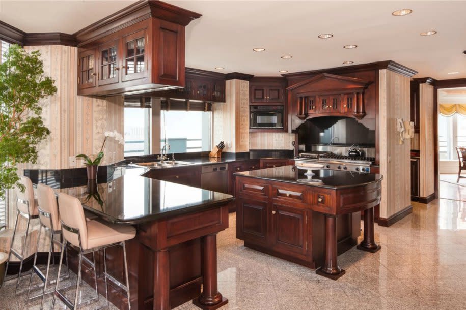 The home has an eat-in chef's kitchen with adjacent butler's pantry.