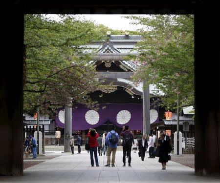 Visitors are seen at the Yasukuni Shrine in Tokyo, Japan, April 21, 2016. REUTERS/Issei Kato