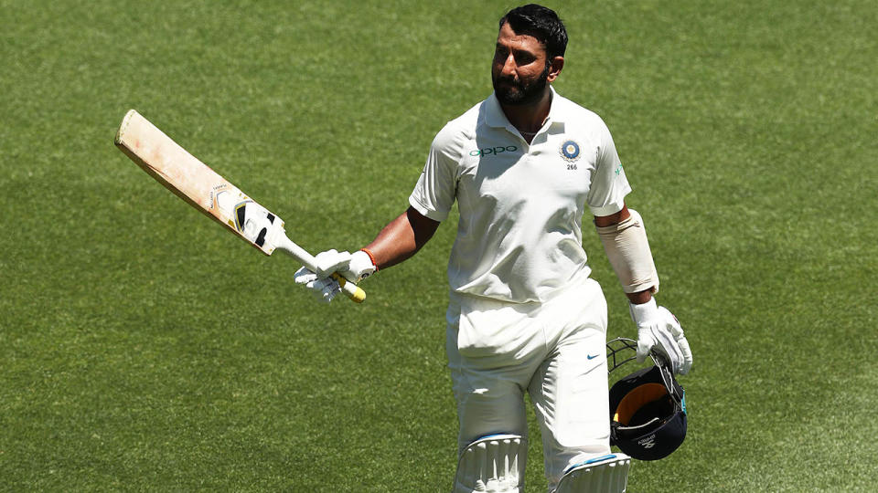 Cheteshwar Pujara raises his bat as he leaves the ground. (Photo by Matt King – CA/Cricket Australia/Getty Images)