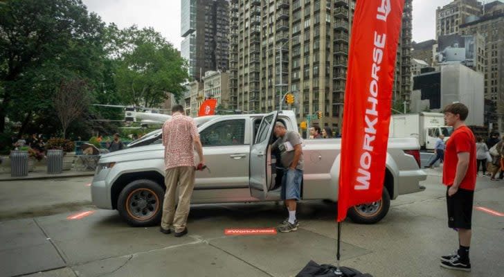 A Workhorse W-15 hybrid electric pickup truck on display at a branding event in Flatiron Plaza in New York.