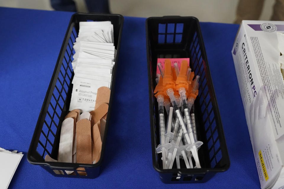 Prepped vaccine filled syringes are at ready for use at a COVID-19 vaccination site at Jackson State University in Jackson, Miss., prior to a visit by First Lady Jill Biden, Tuesday, June 22, 2021, as part of the Biden administration's nationwide tour to reach Americans who haven't been vaccinated and to promote vaccine education. (AP Photo/Rogelio V. Solis)