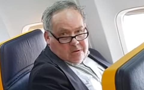 Ryanair passenger (pictured) filmed racially abusing woman on flight is identified by police - Credit: David Lawrence/PA