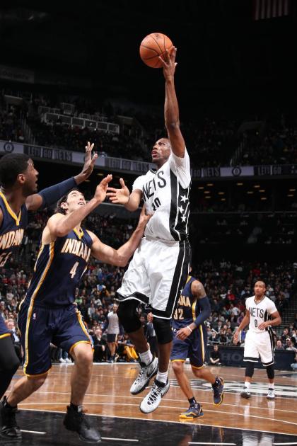 NEW YORK, NY - MARCH 31: Thaddeus Young #30 of the Brooklyn Nets shoots against the Indiana Pacers on March 31, 2015 at the Barclays Center in the Brooklyn borough of New York City. (Photo by Nathaniel S. Butler/NBAE via Getty Images)