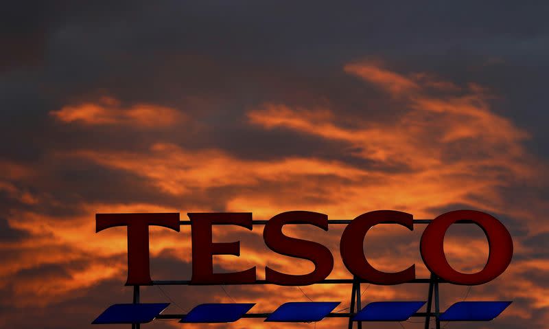 FILE PHOTO - A company logo is pictured outside a Tesco supermarket in Altrincham northern England, April 16, 2016. REUTERS/Phil Noble/File Photo