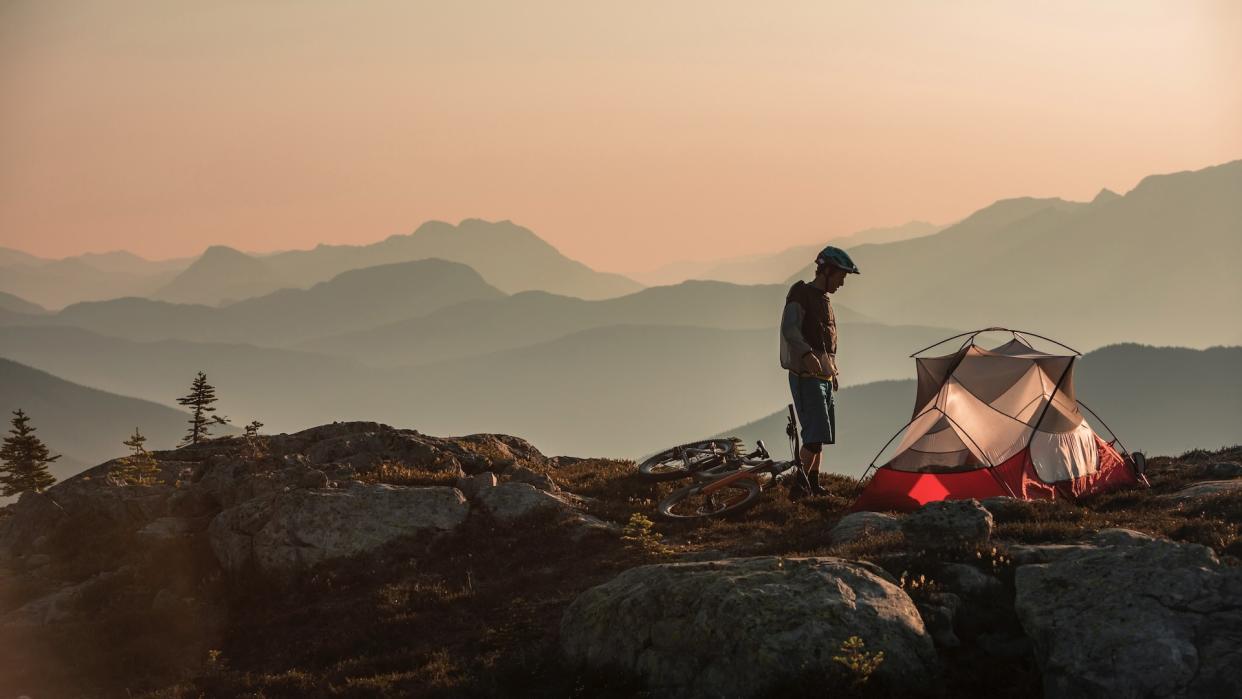  Bikepacker and tent. 