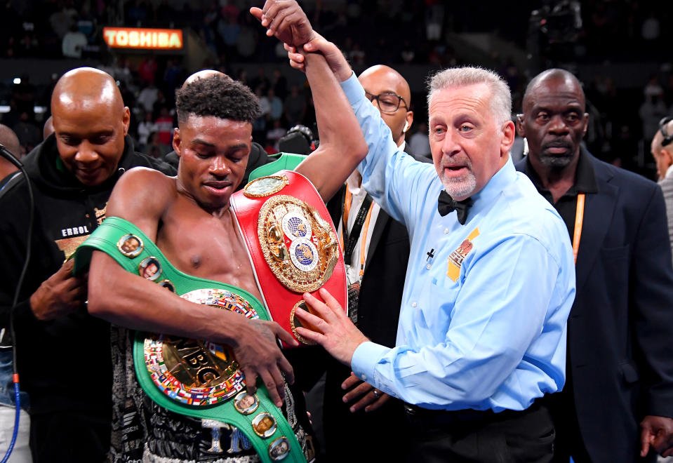 Spence Jr., con sus dos cinturones de campeón. (Foto: Jayne Kamin-Oncea / Getty Images).