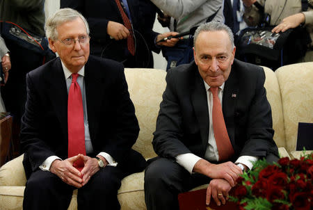 Senate Majority Leader Mitch McConnell and Senate Minority Leader Chuck Schumer take part in a meeting with U.S. President Donald Trump and other Congressional leaders in the Oval Office of the White House in Washington, U.S., December 7, 2017. REUTERS/Kevin Lamarque