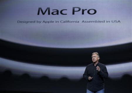 Philip W. Schiller, the Senior Vice President of worldwide marketing at Apple Inc speaks about the Mac Pro on stage during an Apple event in San Francisco, California October 22, 2013. REUTERS/Robert Galbraith