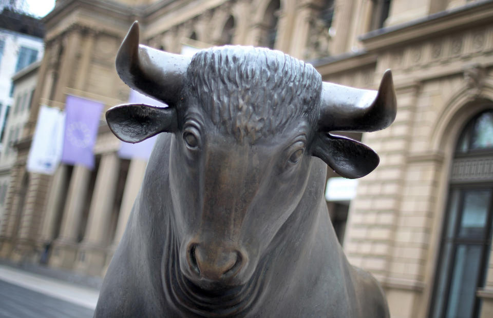 The bull sculpture representing the rise of the market by artist Reinhard Dachlauer in front of the stock exchange operated by Deutsche Boerse AG in Frankfurt am Main, western Germany. Photo: Daniel Roland/AFP/Getty Images