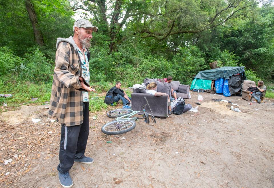Thomas Edmonds talks about living at the Beggs Lane homeless camp in Pensacola on Wednesday, April 26, 2023.