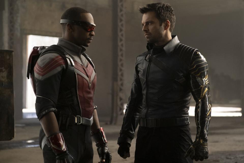 the falcon and the winter soldier   anthony mackie as sam wilson and sebastian stan as bucky barnes, standing side by side