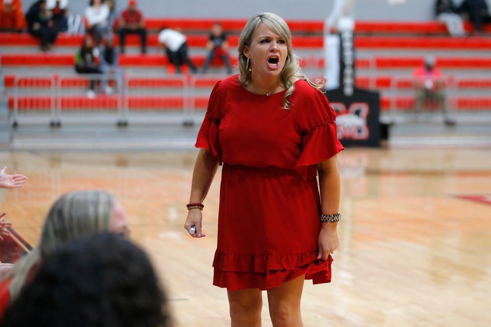 Mustang coach Katie Smith shouts during the girls championship game of the Cornerstone Holiday Classic basketball game between Mustang and Edmond North in Mustang, Okla., Wednesday, Dec. 29, 2021.
