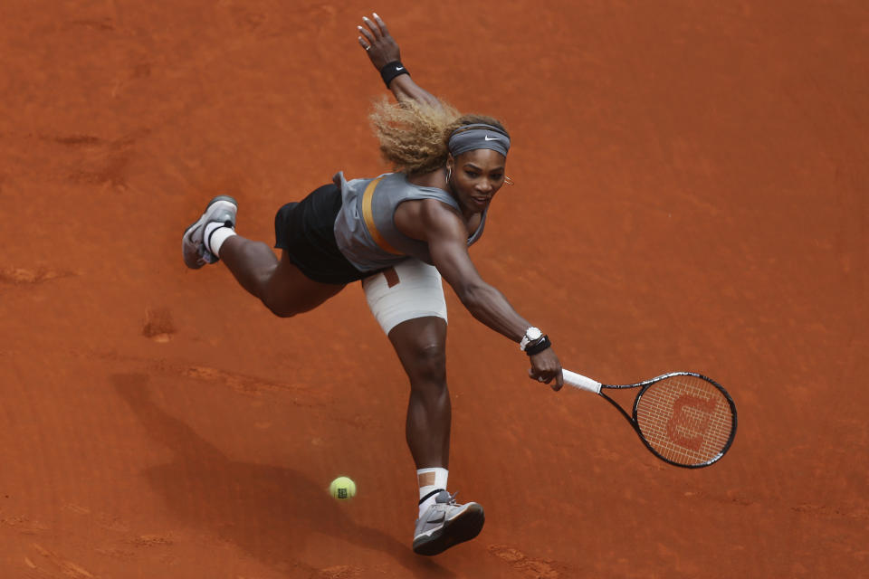 Serena Williams from US returns the ball during a Madrid Open tennis tournament match against Shuai Peng from China, in Madrid, Spain, Wednesday, May 7, 2014. (AP Photo/Andres Kudacki)