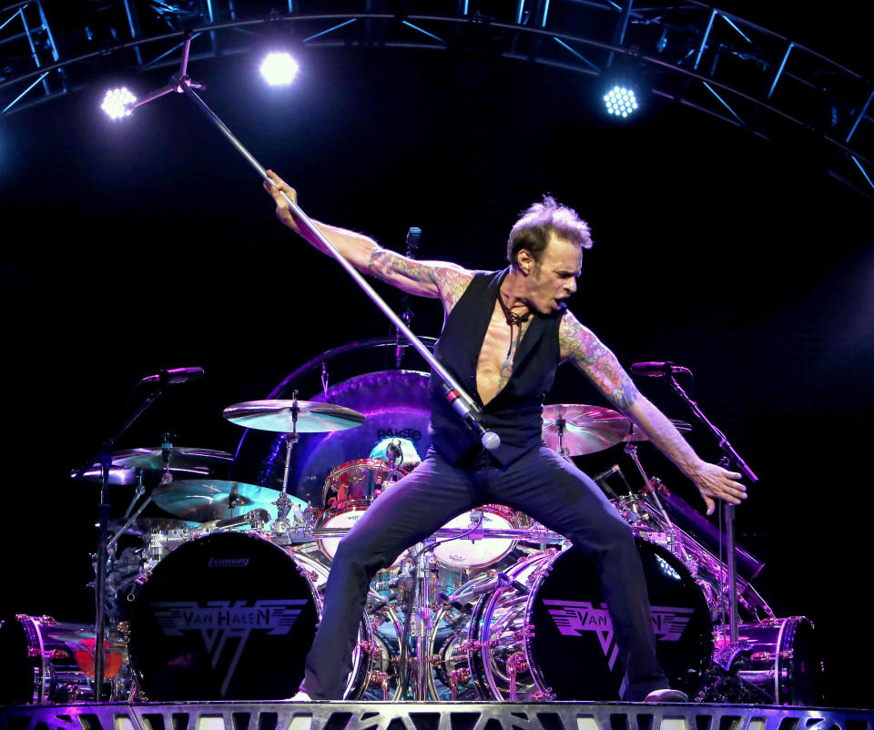 FILE - This Sept. 28, 2015 file photo shows David Lee Roth performing at Ak-Chin Pavillion in Phoenix, Ariz. Roth, the high-kicking lead singer of the rock band Van Halen, will have a mini-residence at the House of Blues Las Vegas in the Mandalay Bay Resort and Casino. He’ll be performing Jan. 8, Jan. 10-11 and March 18, March 20-21, March 25, and March 27-28. Tickets go on sale Saturday.(Photo by Rick Scuteri/Invision/AP, File)