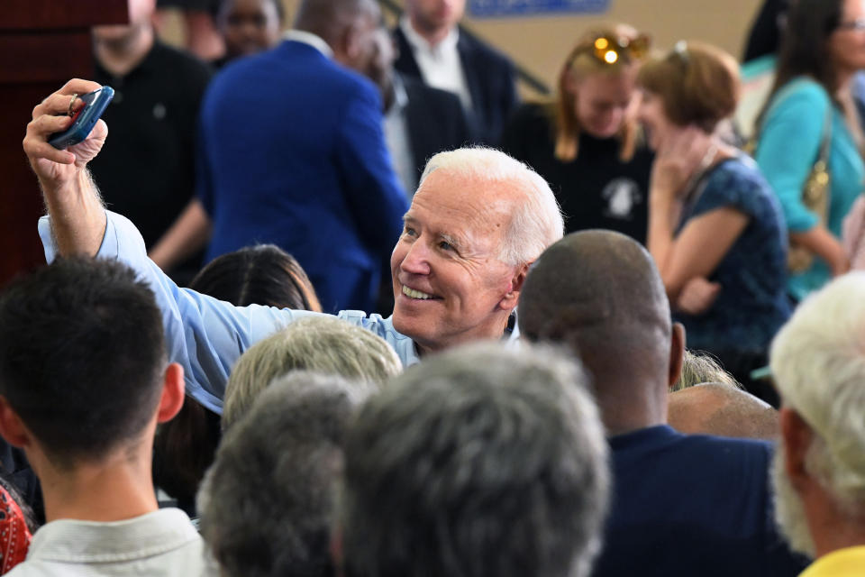 Former Vice President Joe Biden takes photos with supporters following the first rally of his 2020 campaign, Saturday, May 4, 2019 in Columbia, S.C. (AP Photo/Meg Kinnard)