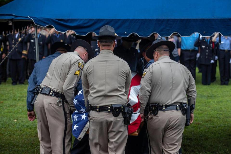 Prestonsburg Police Captain Ralph Frasure is laid to rest at the Gethsemane Gardens in Presontsburg, Ky., on Wednesday, July 6, 2022. Frasure was killed when a man with a rifle opened fire on police attempting to serve a warrant Thursday.