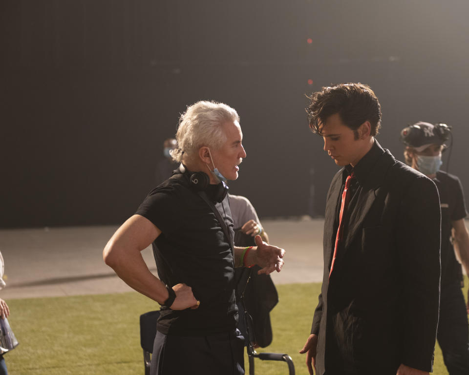 Baz Luhrmann and Austin Butler on the set of “Elvis” - Credit: Warner Bros.