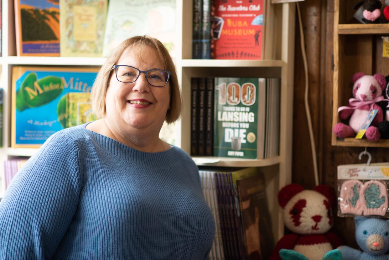 Amy Piper, author of "100 Things to Do in Lansing Before You Die," pictured Tuesday, March 29, 2022, at the Old Town General Store in Lansing.