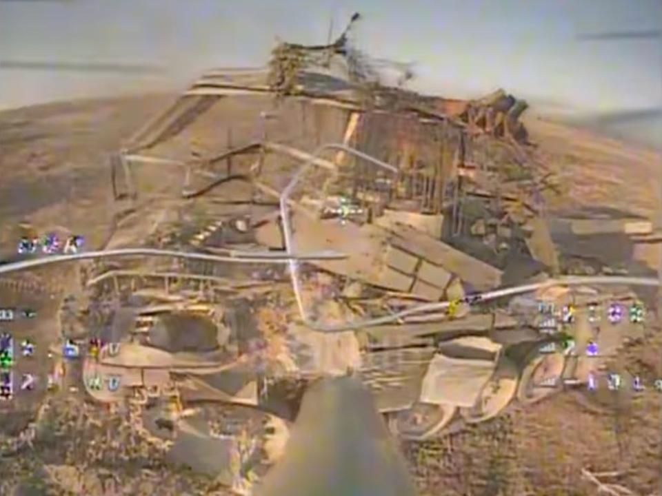 Video still taken from an FPV drone as it approaches an armored vehicle covered with a 'cope cage,' in footage posted by the 8th battalion of the 10th mountain assault brigade "Edelweiss" on May 6, 2024.