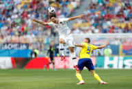 Soccer Football - World Cup - Group F - Sweden vs South Korea - Nizhny Novgorod Stadium, Nizhny Novgorod, Russia - June 18, 2018 South Korea's Kim Young-gwon in action with Sweden's Marcus Berg REUTERS/Matthew Childs