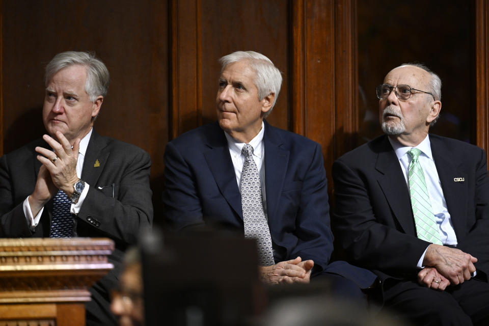 Former Connecticut sSpeakers of the House, from left, Brendan Sharkey, Thomas D. Ritter, and Richard J. Balducci, listen during the opening session of the legislature at the State Capitol, Wednesday, Feb. 7, 2024, in Hartford, Conn. (AP Photo/Jessica Hill)
