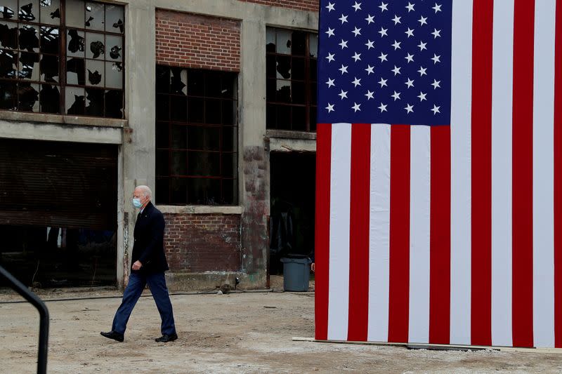 FILE PHOTO: U.S. President-elect Joe Biden campaigns on behalf of Democratic U.S. Senate candidates Ossoff and Warnock in Atlanta, Georgia U.S. President-elect Joe Biden campaigns on behalf of Democratic U.S. senate candidates Ossoff and Warnock in Atlanta