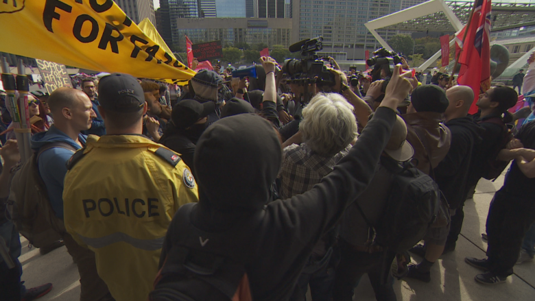 4 charged after demonstrators clash at Toronto's Nathan Phillips Square