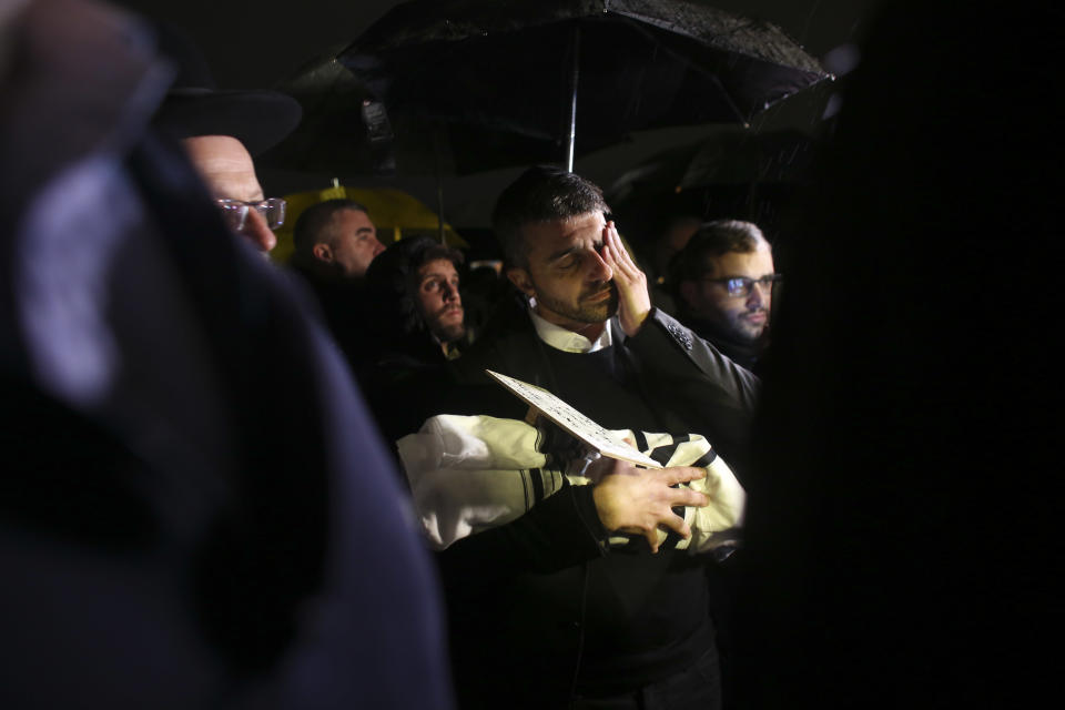 People attend the funeral of a baby who died after being prematurely delivered after her mother Shira Ish-Ran was wounded in a shooting attack near Ofra settlement in the West Bank last Sunday, in Jerusalem, Wednesday, Dec. 12, 2018. (AP Photo/Heidi Levine)