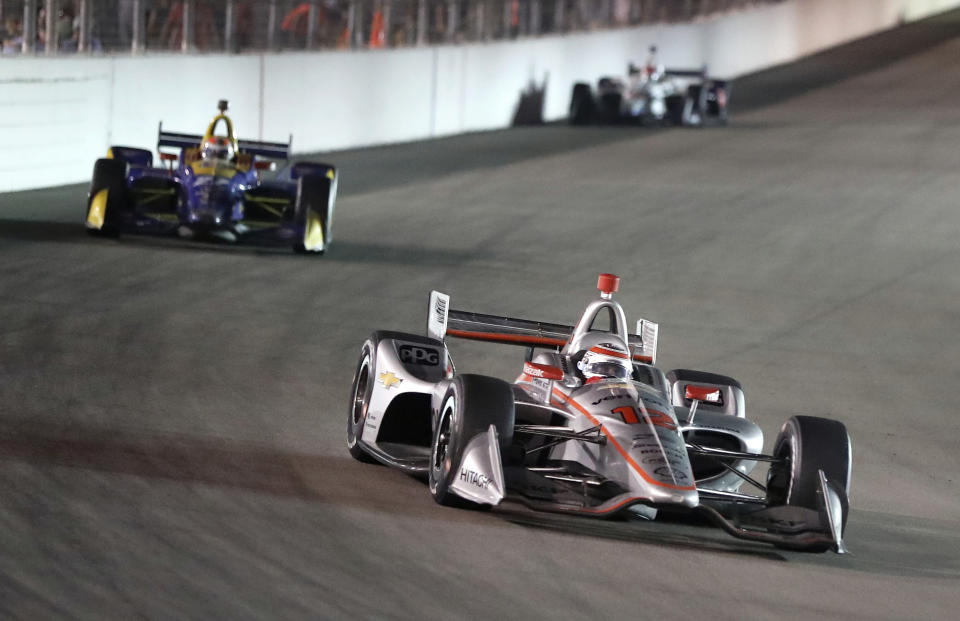 Will Power, front, of Australia, drives ahead of Alexander Rossi during the IndyCar auto race at Gateway Motorsports Park Saturday, Aug. 25, 2018, in Madison, Ill. Power went on to win the race, and Rossi finished in second. (AP Photo/Jeff Roberson)