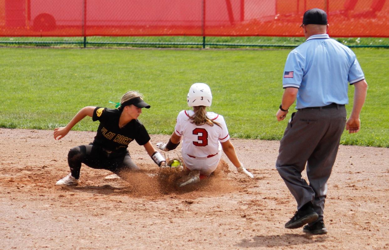 Avery Collett steals second base for Monroe during a 5-1, 8-7 sweep of Flat Rock on Saturday, May 4, 2024.