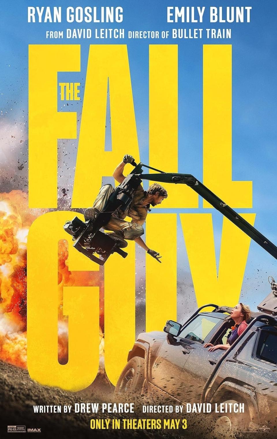 Movie poster for "The Fall Guy" showing Ryan Gosling and Emily Blunt in an action scene with an explosion. In theaters May 3