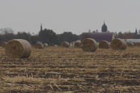 The campus of the College of Saint Benedict is seen through the surrounding farmland in St. Joseph, Minn., on Tuesday, Nov. 8, 2022. The college, founded by Benedictine sisters for women's education, has been seeking new ways to welcome LGBTQ students, which is a fraught concern for hundreds of U.S. colleges and universities run by the Catholic Church and various conservative Protestant denominations. (AP Photo/Giovanna Dell'Orto)